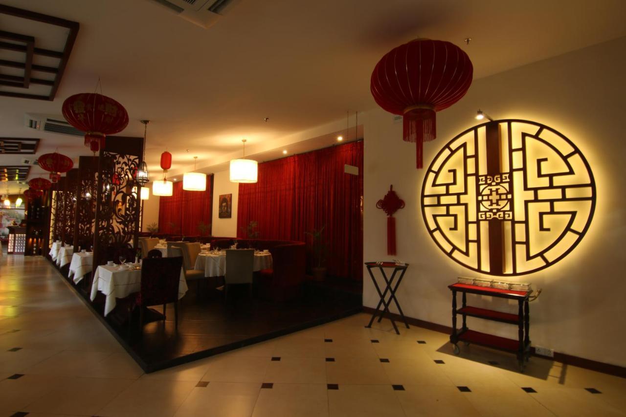 Ramada Plaza By Wyndham Karachi Airport Hotel Esterno foto Interior of a restaurant in Beijing